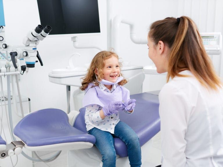 Small child in meeting with dentist