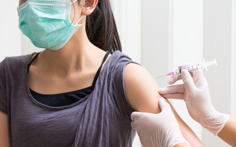 Woman Getting Vaccination