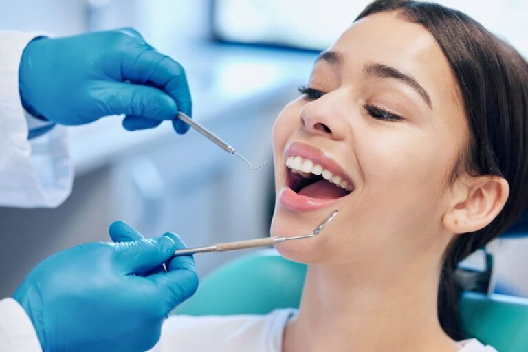 Dentist hands, woman patient and mouth inspection for hygiene with healthcare consultation and metal tools in clinic.